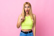 © luismolinero - Young Uruguayan blonde woman over isolated pink background intending to realizes the solution while lifting a finger up