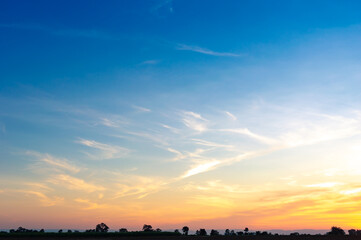 beautiful vivid sky painted by the sun leaving bright golden shades.dense clouds in twilight sky in 