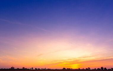 Wall Mural - beautiful vivid sky painted by the sun leaving bright golden shades.dense clouds in twilight sky in 