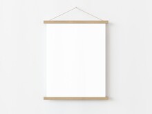 One Vertical Rectangle Roll Up Poster Mockup With Light Wood Border Hanging On A White Wall In Empty Room. Isolated Roll Up Poster Mockup Template On White Background. 3D Illustration