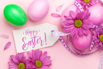 Easter greeting card with colorful easter eggs and flowers