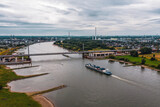 Fototapeta Londyn - Panoramic view of Leverkusen, Cologne and the ailing autobahn bridge on the Rhine, Germany. Drone photography.