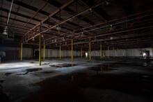 Empty Warehouse Inside An Abandoned Factory Building