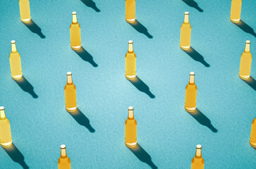 Leinwandbilder - Several beer bottles with long shadows on light blue background.
