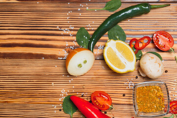 Wall Mural - Cooking table. Background with spices and vegetables. Top view. Free space for your text.