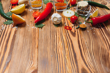 Wall Mural - Cooking table. Background with spices and vegetables. Top view. Free space for your text.