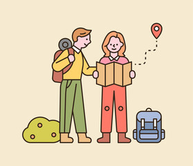 Wall Mural - A couple is backpacking. They are standing on the road and looking at the map. flat design style minimal vector illustration.