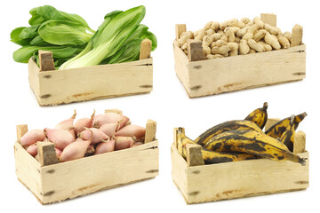 Wall Mural - Assorted cooking vegetables in a wooden crate on a white background