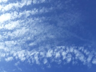 Beautiful white clouds, blue sky, the azure stratosphere, and spindrift, with texture background in nature for wallpaper pattern concept.