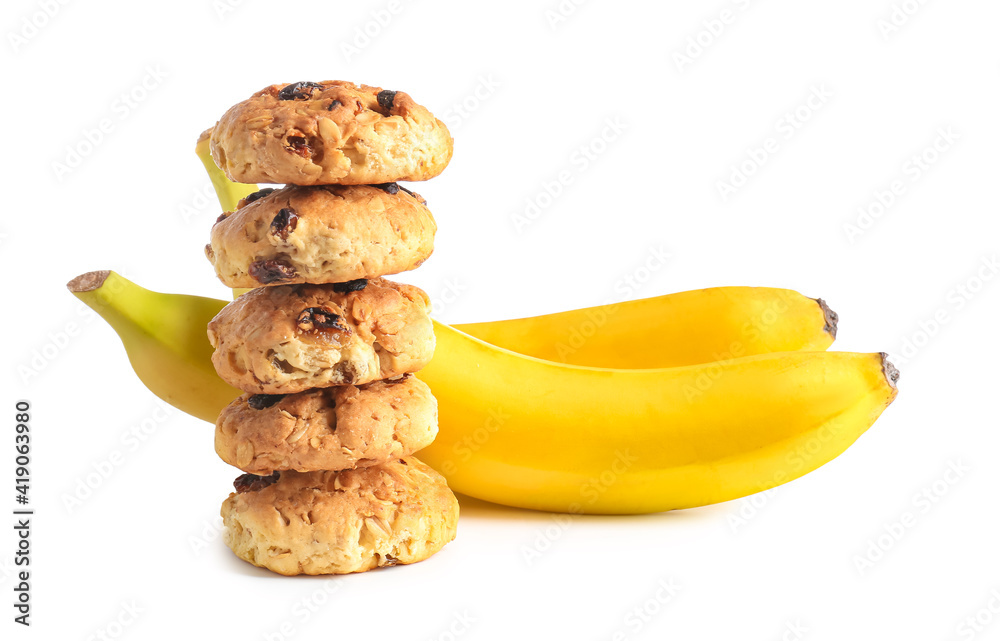 Tasty cookies and bananas on white background