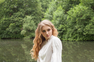 Wall Mural - lovely woman with blonde hair outdoors