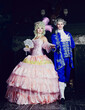  woman in the Marie Antoinette style and partner