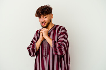 Wall Mural - Young Moroccan man isolated on white background scared and afraid.