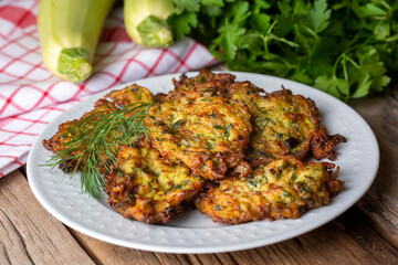 Wall Mural - Mucver, Turkish traditional food. (Turkish cuisine) Homemade Food with Zucchini.