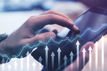 Poster - Growing stock market concept with financial diagram and arrows up on backdrop with man hand touching digital tablet
