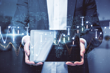 Poster - Big data network technologies concept businessman shows digital tablet screen and abstract glowing statistic indicators