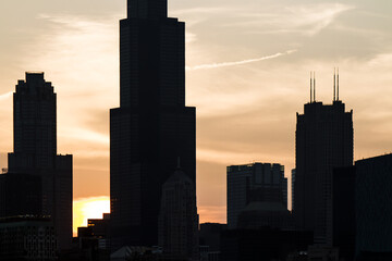 Fototapete - Dark city skyscrapers silhouette on the sunset