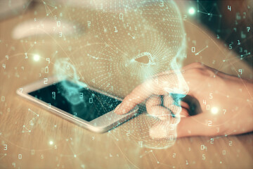 Double exposure of brain sketch hologram and woman holding and using a mobile device.