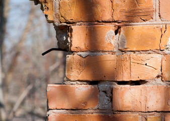 Poster - old brick wall. Brick wall background, brick texture. background, old wall, red brick, cracked cement joint. close-up, space for text