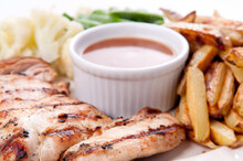 Bbq Chicken Breast With Fries, Jus And Vegetables