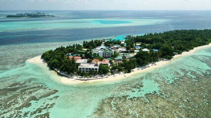 Bird's eye view of tropical islands in the ocean. View of the islands from a drone. Maldives, Thinadhoo (Vaavu Atoll), Dhigurah