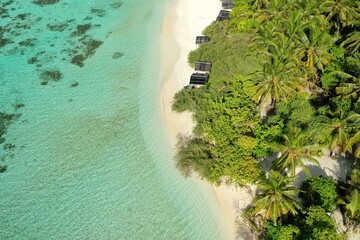 Wall Mural - Bird's eye view of tropical islands in the ocean. View of the islands from a drone. Maldives, Thinadhoo (Vaavu Atoll), Dhigurah