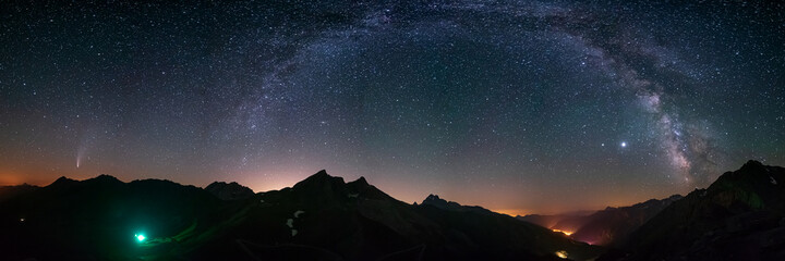 Wall Mural - milky way arc and stars in night sky over the alps. outstanding comet neowise glowing at the horizon
