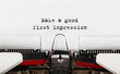 Text Make a good first impression typed on retro typewriter