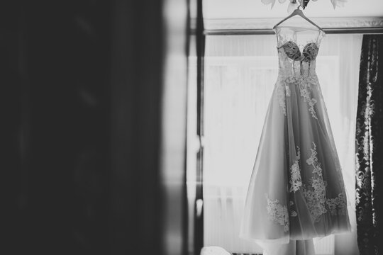 the perfect wedding dress in the room of the bride