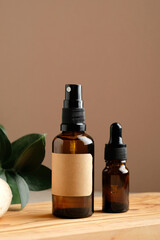 Wall Mural - set of natural organic spa beauty products on wooden board. amber glass spray bottle, homemade soap,