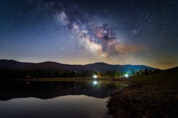 the milky way rises and shines over lake arrowhead and shenandoah national park just outside the tow