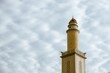 Mosque minaret with cloud sky on background. With empty space for text marhaban ya ramadan or ramadan kareem background. 