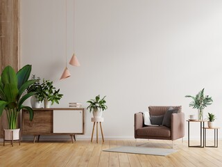 modern minimalist interior with an armchair on empty white wall background.