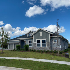 A luxury gray house in the Laureate Park neighborhood