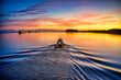 boat underway at sunrise