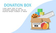 © Viktoriia - Cardboard donation box full of toys, books, clothes and devices. Volunteer giving clothing donation box