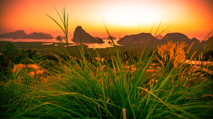 Panoramic nature background (mountains, sea, trees, twilight lights in the sky, waterfront communities), naturally blurred through the wind, seen on tourist spots or scenic spots