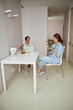 © Viacheslav Yakobchuk - Cute females having pleasant conversation while eating