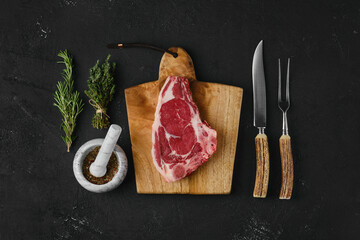 Wall Mural - Top view of raw strip steak bone in