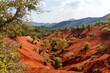 Red clay terrain, a rare geological phenomenon, as seen near Preveza city, in Epirus region, Greece, Europe.