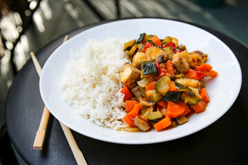 vegetable asian meal tofu and vegetables stir fried with white rice