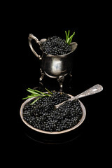 Wall Mural - Black sturgeon caviar in retro vintage dish