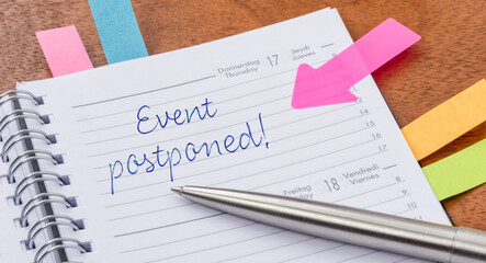 Wall Mural - Daily planner with the entry Event postponed