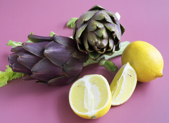 Closeup shot of artichokes on a colour background