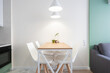 Contemporary dining table with white lights