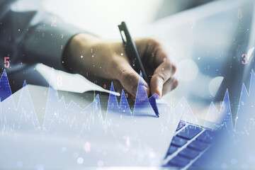 Poster - Multi exposure of stats data illustration with hand writing in notebook on background with laptop, computing and analytics concept