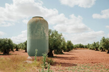 Water Tank In The Middle Of An Olive Grove