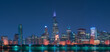 © Ivan Ferrero/ADDICTIVE STOCK - Night cityscape of Chicago with contemporary buildings and towers illuminated by colorful lights reflecting in calm lake water