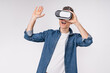 Excited mature caucasian man using VR-glasses isolated over white background