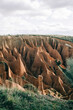 © Nacho Zaitsev/ADDICTIVE STOCK - Scenery view of gorge with dry surface surrounded by green mount on sunny day in Spain